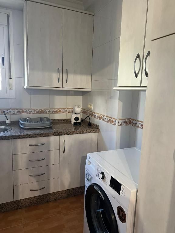 Cocina con lavadora